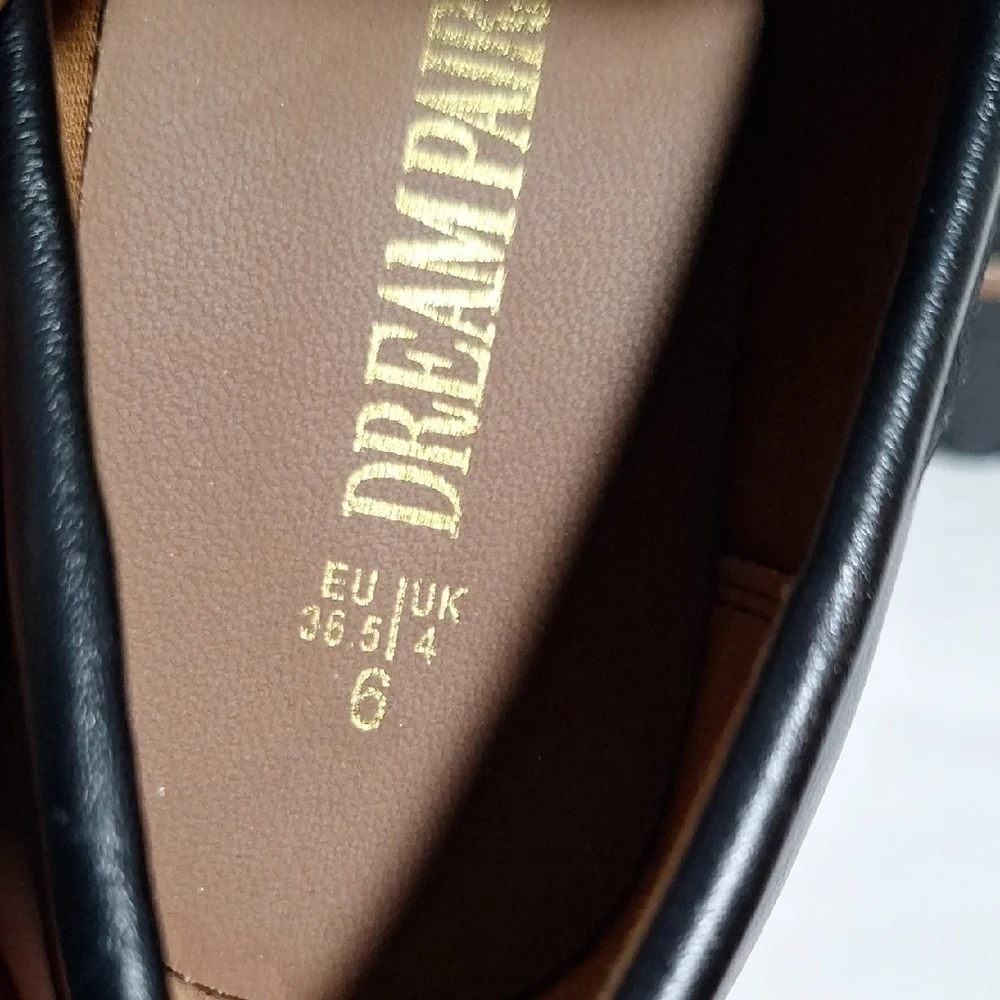 Dream Pairs Black Leather Flats with Classic Penny Design